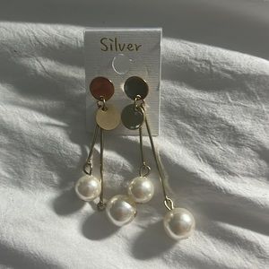 Gold Dangling Pearl Earrings